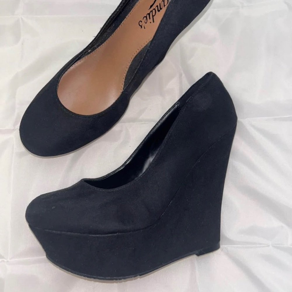 Women’s black platform heels. Worn once. Candies size 8